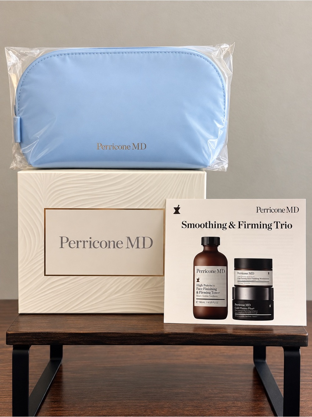 Perricone MD Smoothing & Firming Trio with light blue cosmetics bag